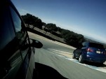 BMW's X5M takes the shortest line through Laguna Seca's corkscrew.