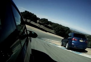 BMW's X5M takes the shortest line through Laguna Seca's corkscrew.