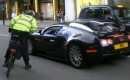 Bugatti Veyron driver pulled over by bicycle cop.