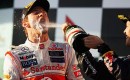 Button gets a champagne mouthful from Vettel