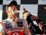 Button gets a champagne mouthful from Vettel