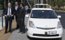 CA Governor Jerry Brown, State Sen. Alex Padilla, and Google's Sergey Brin beside an autonomous car
