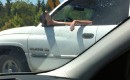 Carefree (and careless) Dodge Ram driver on the highway
