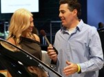 Carolla interviews manufacturer rep at NY Auto Show. Photo via SpeedTV.