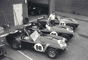 Carroll Shelby with 3 Cobra roadsters in 1963