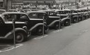 Cars parked diagonally along parking meters, Omaha, Nebraska, 1938 (via Wikimedia)