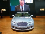 CEO Dr. Franz-Josef Paefgen and 2011 Bentley Continental GT