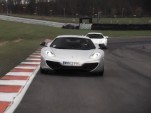 Chris Harris duels with Mat Johnson at Brands Hatch