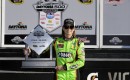 Danica Patrick poses with her Sprint Cup pole award - image: Stewart-Haas Racing