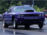 Daniels wheels her Dodge Challenger down the drag strip. Image courtesy of Tiff Daniels.