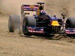 David Coulthard plays in the Texas dirt. Image: Red Bull