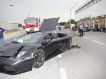 Destroyed Murcielago, in front of destroyed BMW dealership - image courtesy La Provincia