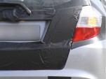 detail of spy shot of Honda Fit Hybrid being tested in Germany