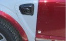 detail of spy shot showing GM Two-Mode Plug-In Hybrid being tested in Saturn Vue mule