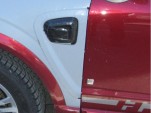 detail of spy shot showing GM Two-Mode Plug-In Hybrid being tested in Saturn Vue mule