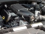 Dodge Challenger engine bay showing Lingenfelter supercharger