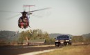 Dodge Challenger SRT8 versus an MD 500-D helicopter