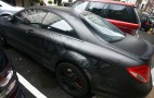 Empire Coachworks builds custom Audigier-designed Ed Hardy Mercedes-Benz CL63