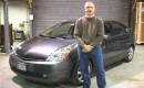 Editor John Voelcker of GreenCarReports.com in front of 2008 Toyota Prius