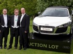 Elton John with friends and the chrome Audi R8 Spyder