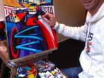 Erwin Dazelle at his easel - photo courtesy Toyota Grand Prix of Long Beach
