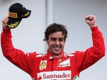 Fernando Alonso celebrates his third win this year