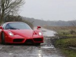 Ferrari Enzo supercar in the mud