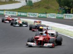 Ferrari's Fernando Alonso leads a pack of drivers at the 2012 Formula 1 Brazilian Grand Prix