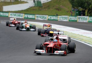 Ferrari's Fernando Alonso leads a pack of drivers at the 2012 Formula 1 Brazilian Grand Prix