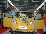 First Tata Nano rolls out of new Sanand factory on June 2, 2010, with founder Ratan Tata at left