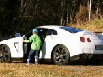 Five-year-old kid hoons a Nissan GT-R