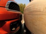 Bumper scuffs attest to the difficulty of parking a car with 15 cm to spare