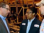 Ford's Joe Hinrichs talks with workers