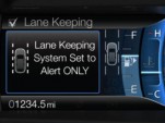 Ford's Lane Keeping System, available on the 2013 Fusion sedan.
