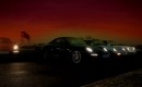 Four generations of the Porsche 911 Carrera 4 line up for a photo op