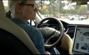 GigaOm's Katie Fehrenbacher behind the wheel of a 2012 Tesla Model S (video screen capture)