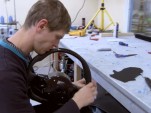 Hand-stitching the leather panels on the Agera R's steering wheel