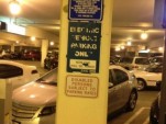 Handicapped parking space Shares Room With Electric Car Charging Station