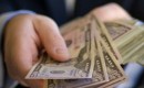 handing over cash