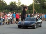 Man completes jump over moving Acura NSX