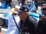 Inattentive woman gets knocked down during pit stop practice
