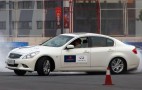 F1 Champ Sebastian Vettel Takes Pair Of Infinitis Around A Track