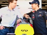 Infiniti's Simon Sproule and Sebastian Vettel