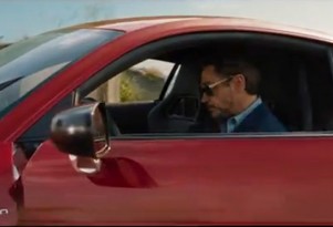 Iron Man Tony Stark (Robert Downey Jr.) in the Audi R8 e-tron