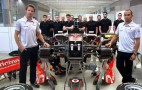 Video: McLaren F1 Drivers Button And Hamilton Assemble An F1 Car
