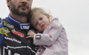 Jimmie Johnson with his daughter during Daytona 500 driver introductions - Anne Proffit photo