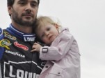 Jimmie Johnson with his daughter during Daytona 500 driver introductions - Anne Proffit photo