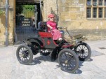 Joy Rainey in her 1904 Curved Dash Oldsmobile