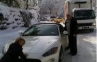 Stronglady Katie Couric Pretends To Push Barry Diller's Maserati Out Of The Snow