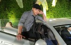 Kellan Lutz Strikes Jaunty Pose Beside An Aston Martin Rapide. We're Confused.